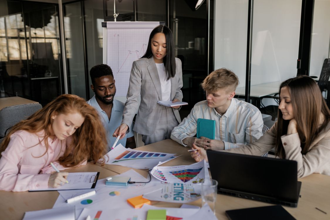 Diverse team collaborating in a modern office